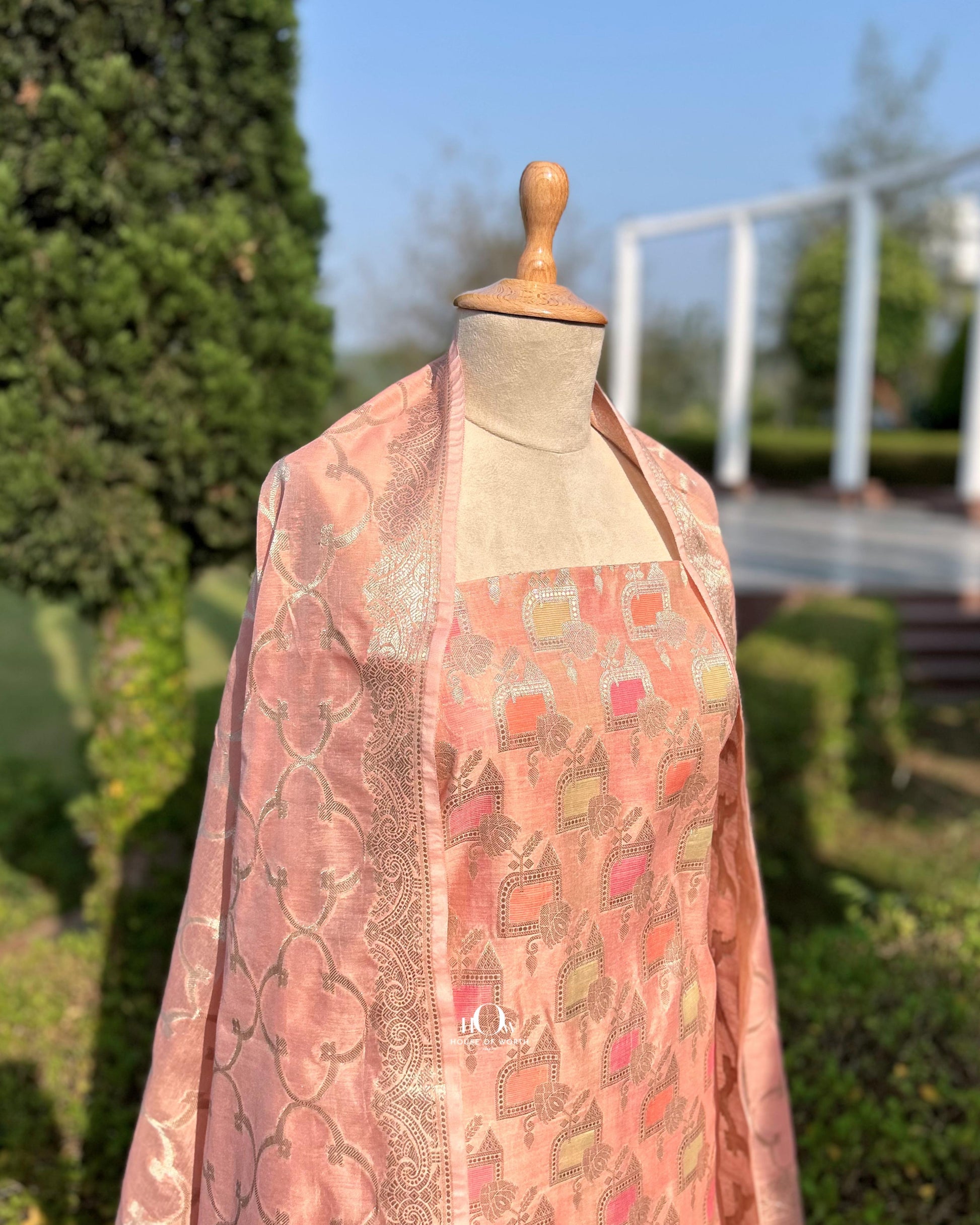 Traditional peach Banarasi suit for festive and wedding.