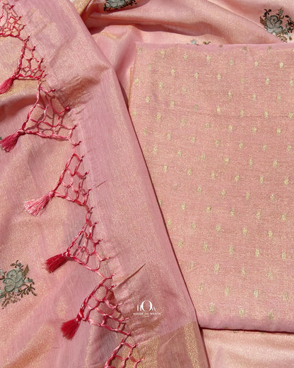 Breathable Banarasi cotton-tissue suit, peach tone with gold and silver zari detailing.