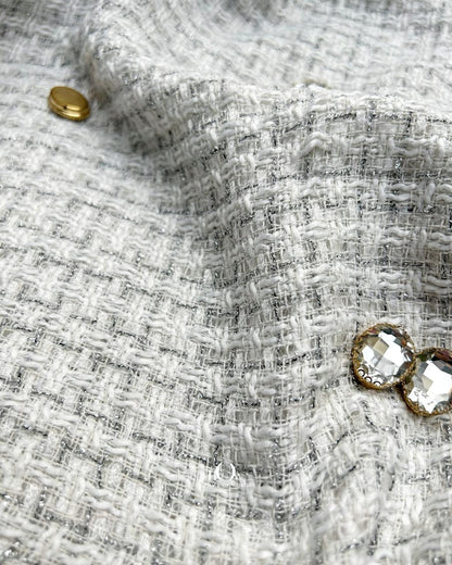 Imported tweed fabric in white colour.