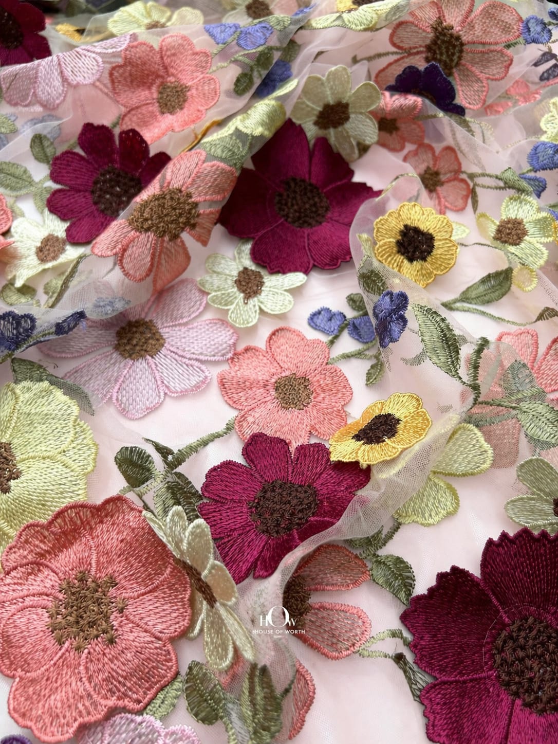 Baby light pink floral applique fabric with soft raised flowers on net, romantic couture finish