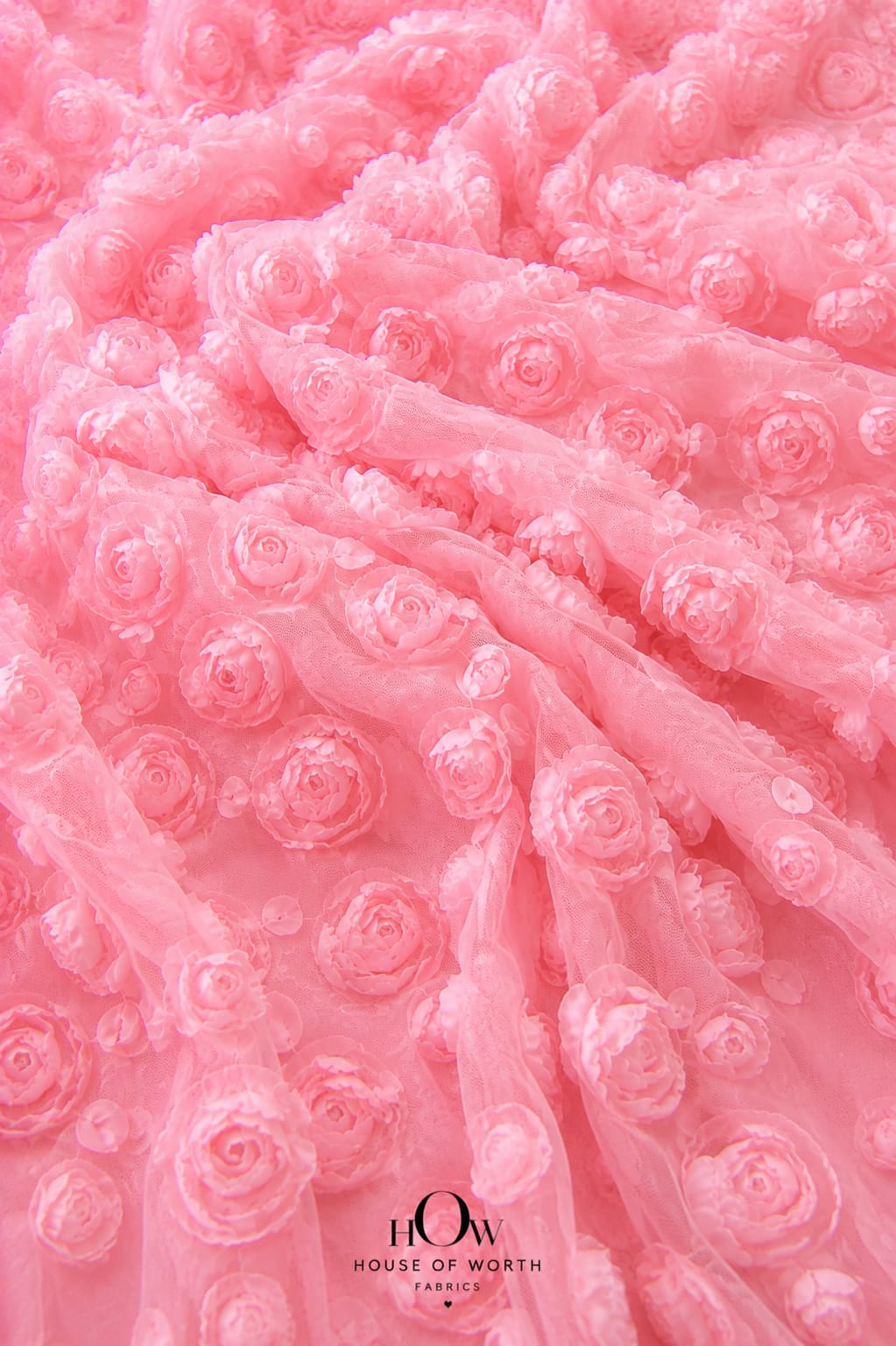 Baby pink 3D floral applique net fabric for bridal and party wear