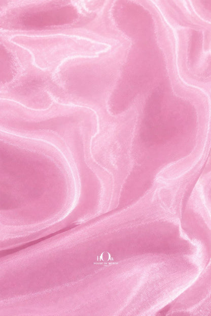 Luxury glass organza fabric in pastel pink shade for fashion collections