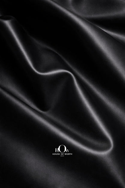 Black leather fabric for upholstery on sofas and chairs with sleek, wipe-clean surface