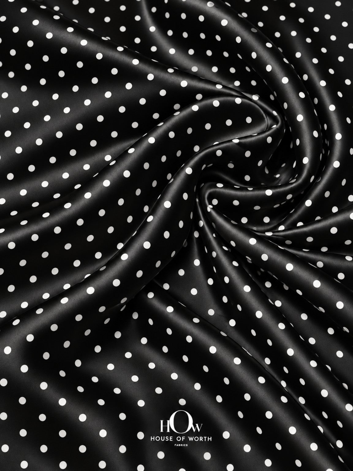 Black and white polka dot satin suited to dresses, skirts, tops and western wear