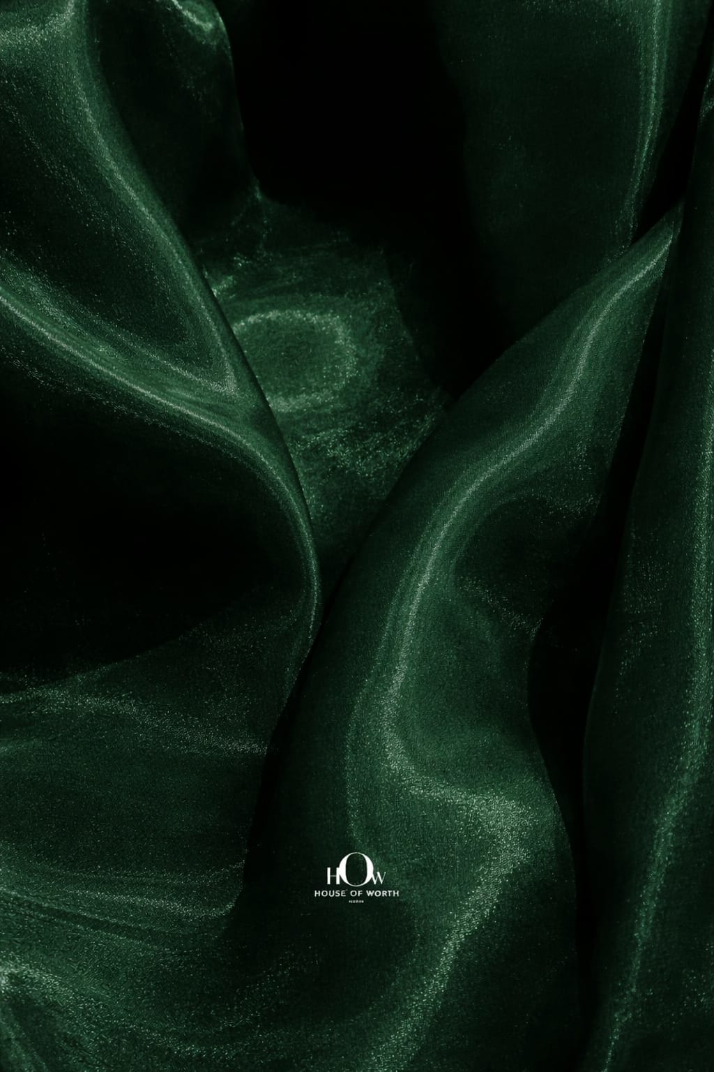 Luxury organza fabric in dark green shade for designer collections