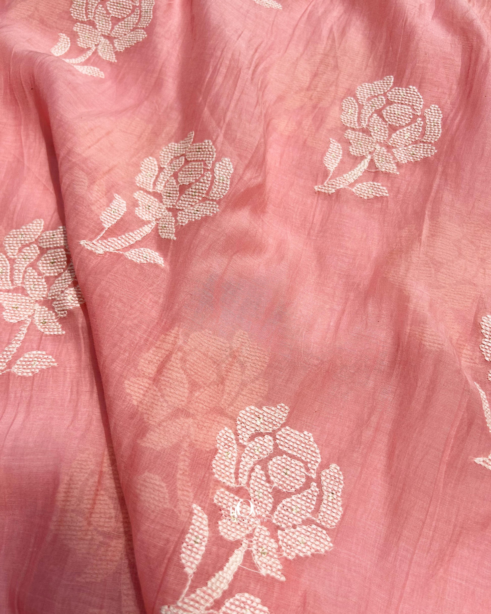 Peach pink Mul Chanderi fabric with embroidery for suits and sarees – pure handloom textile with Banarasi-inspired design.