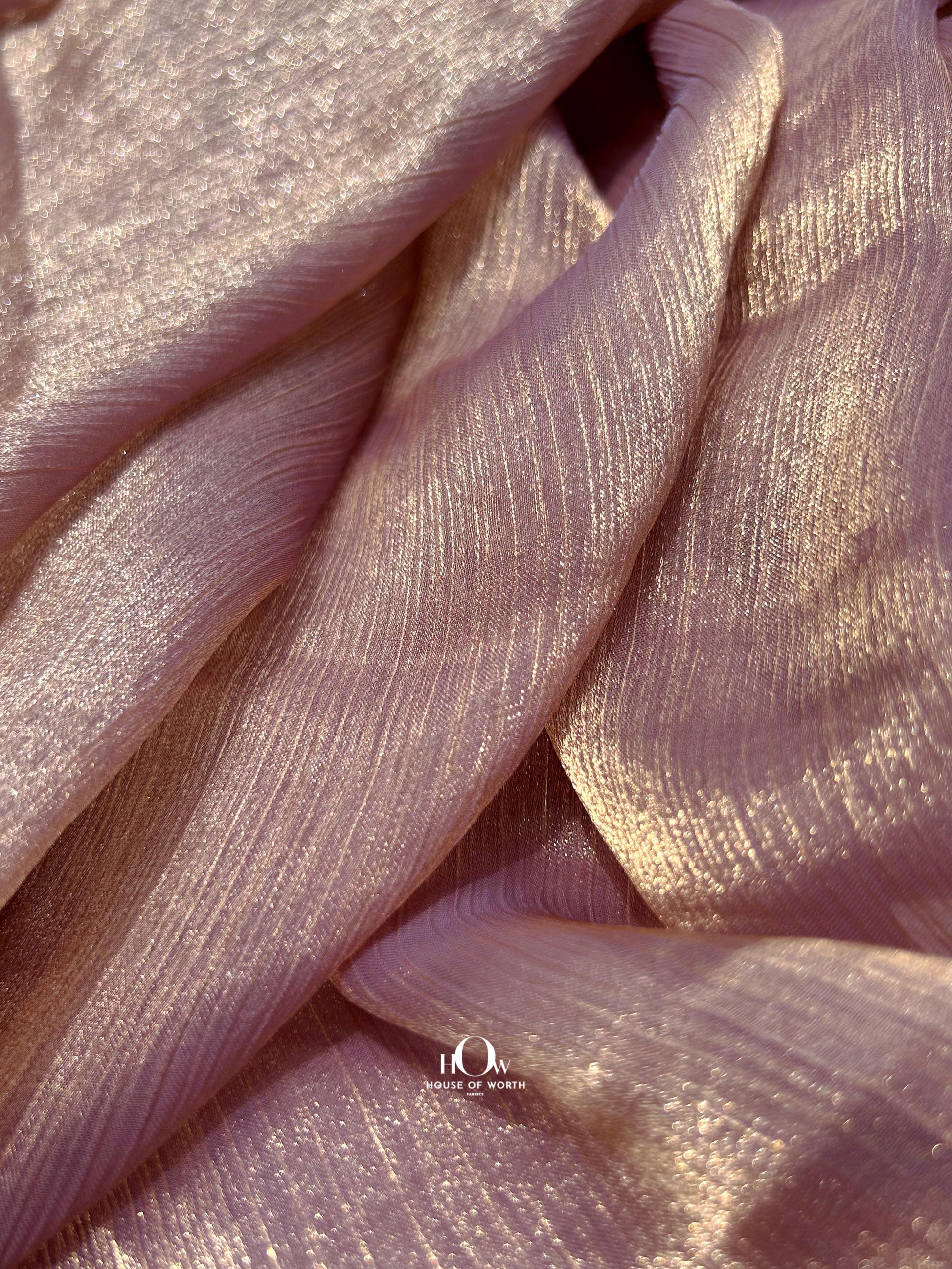 Silk-blend chiffon for bridal overlays and sarees – bulk supply available from Delhi fabric wholesalers.