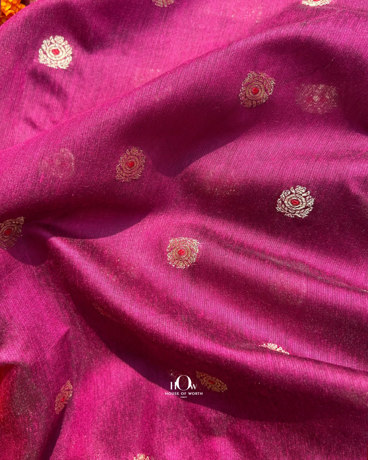 Deep magenta Chanderi material with gold toned buti motifs for festive ethnic wear