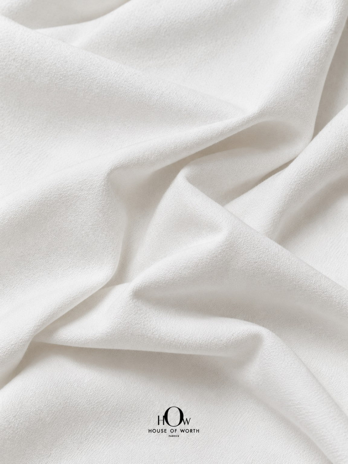 White denim fabric with clean folds for jeans, jackets, trousers, skirts and western wear