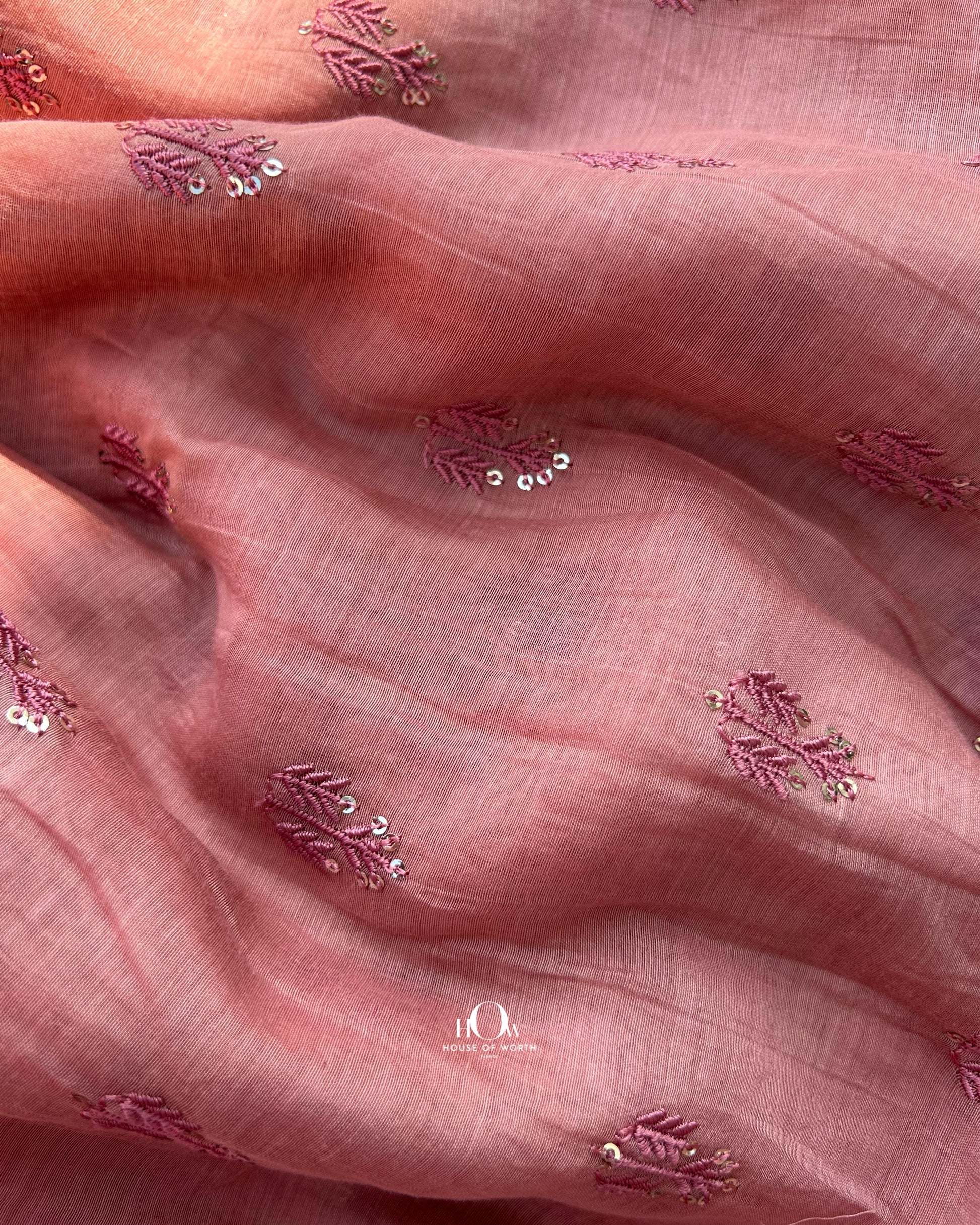 Buy sequin embroidered Mul Chanderi fabric in bulk – perfect for light ethnic collections and designer tailoring.