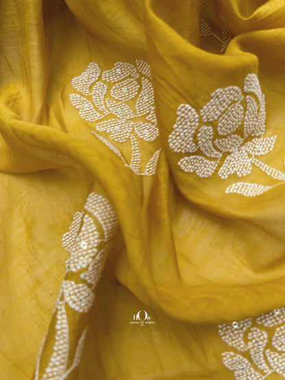 Yellow Mul Chanderi fabric with intricate white embroidery – sourced from suppliers in Surat, Varanasi, and Delhi for bulk and custom orders