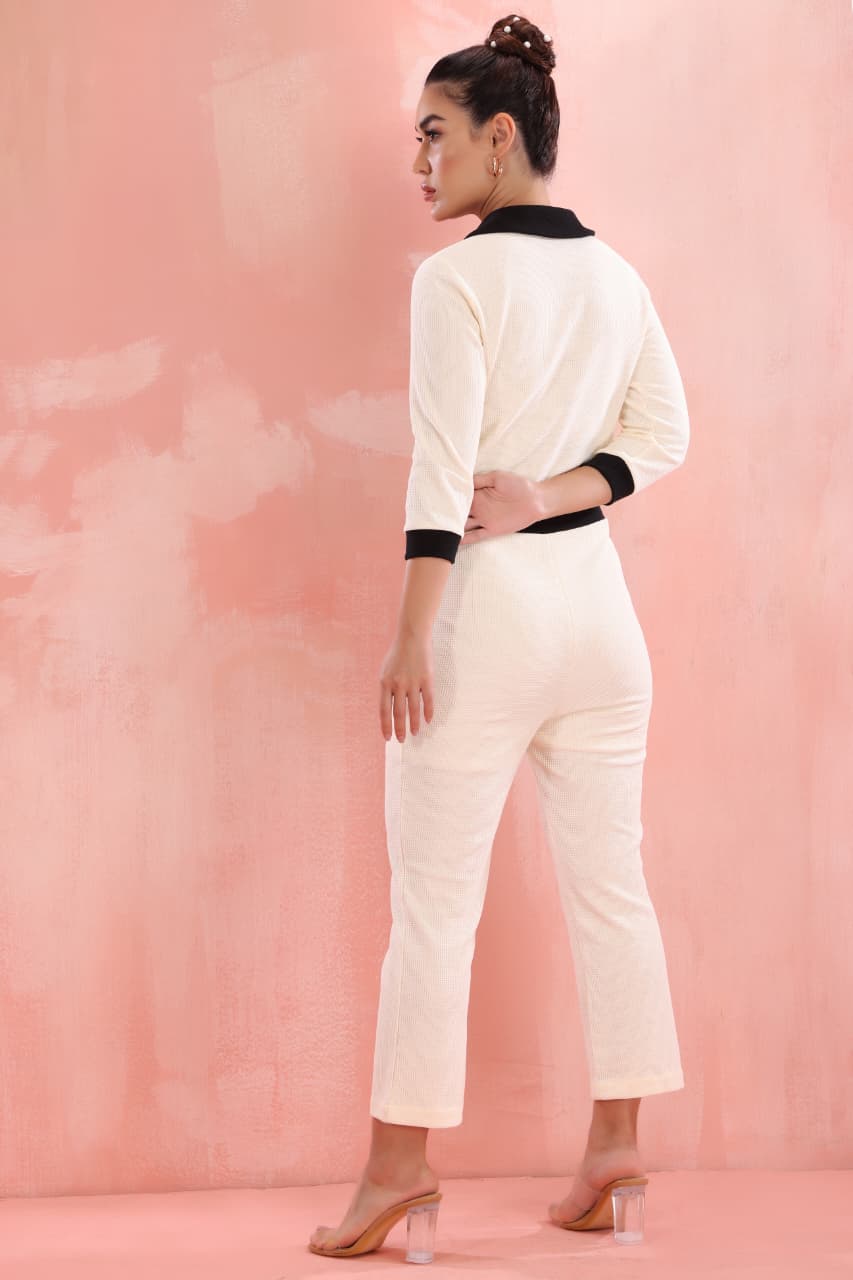  Elegant ladies cream and black contrast jumpsuit for women casual chic outfit