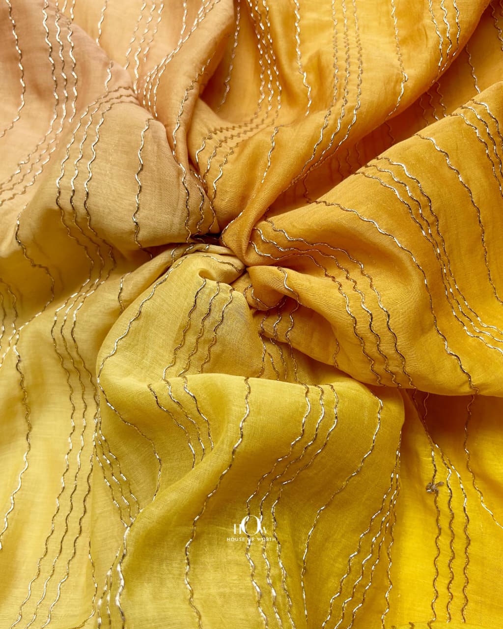 Pure mul chanderi fabric in yellow brown ombre with delicate embroidery
