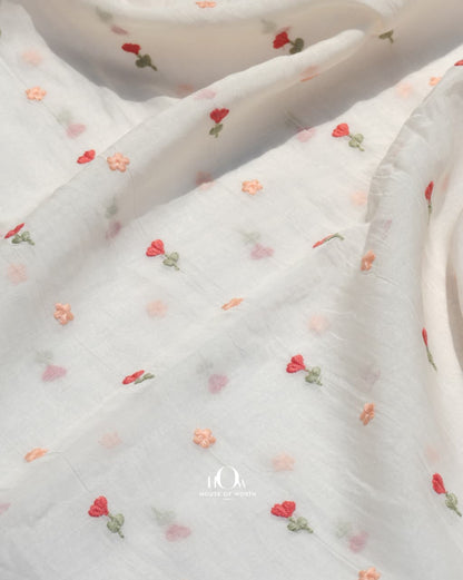Lightweight white chanderi fabric featuring elegant all-over floral motifs