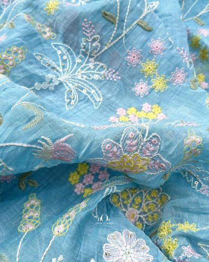 Pure mul Chanderi fabric adorned with floral embroidery, breathable and elegant