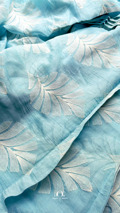 Buy crinkle finish Mul Chanderi fabric in sky blue – soft and breathable fabric perfect for boutique and designer collections.