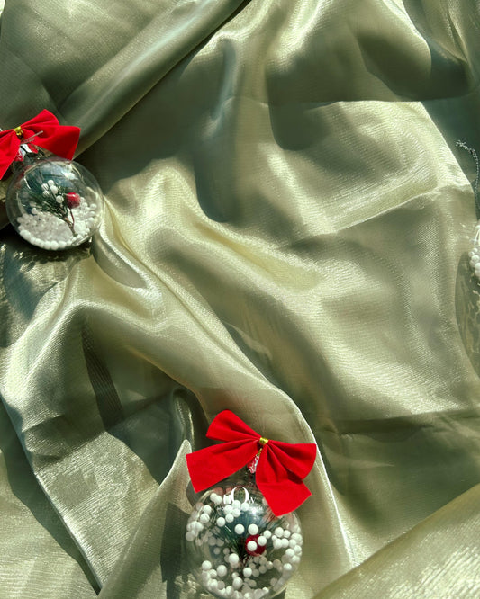 Glossy glass organza for cape gowns and structured dupattas – available from Delhi fabric dealers.