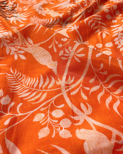 Bright orange Malai Chanderi fabric with nature pattern – soft and breathable material for summer suits.