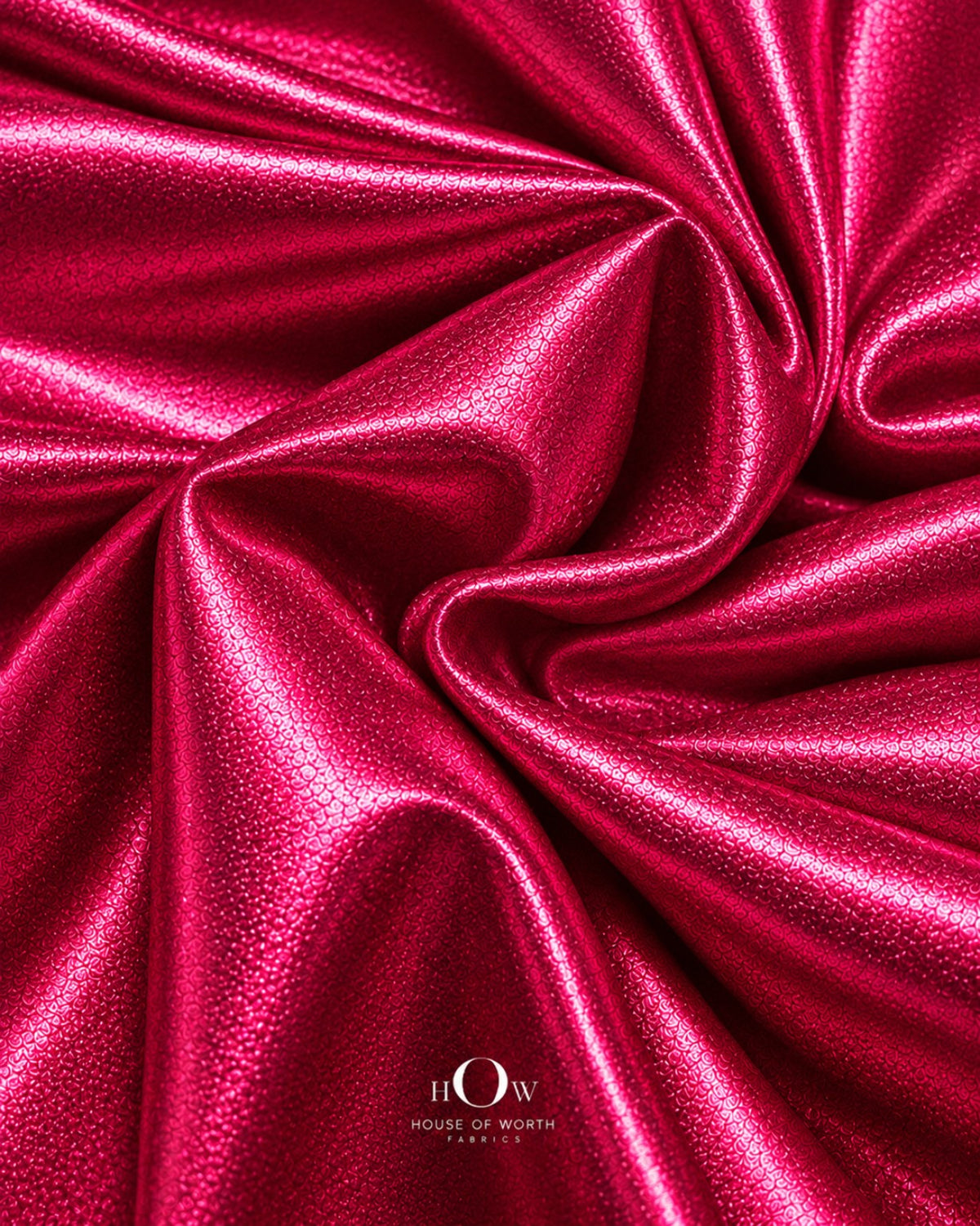 Close view of hot pink metallic Disco Lycra fabric for partywear and costumes