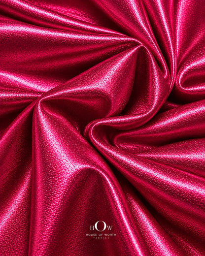 Close view of hot pink metallic Disco Lycra fabric for partywear and costumes