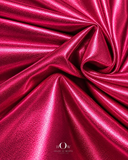 Hot pink shiny metallic Lycra fabric drape for dresses, stagewear and statement fashion