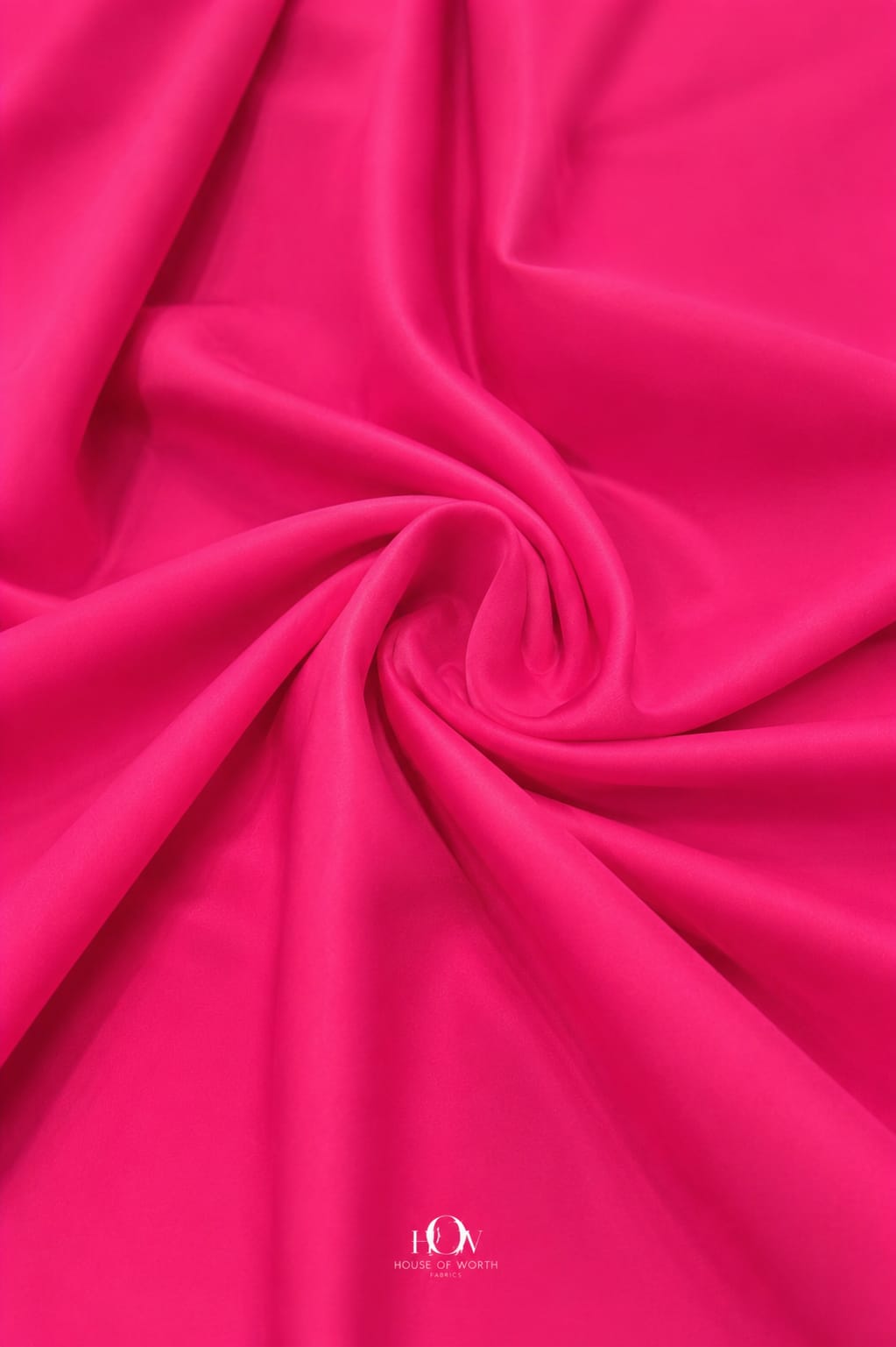 Hot pink 4 way Lycra fabric showing multidirectional stretch for flexible movement. 
