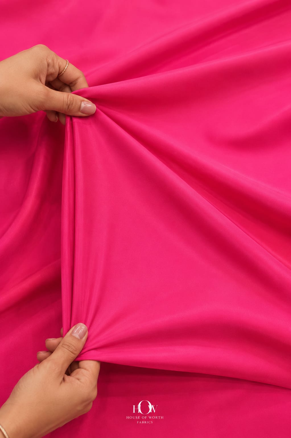 Hot pink imported four way Lycra fabric with a smooth premium surface.