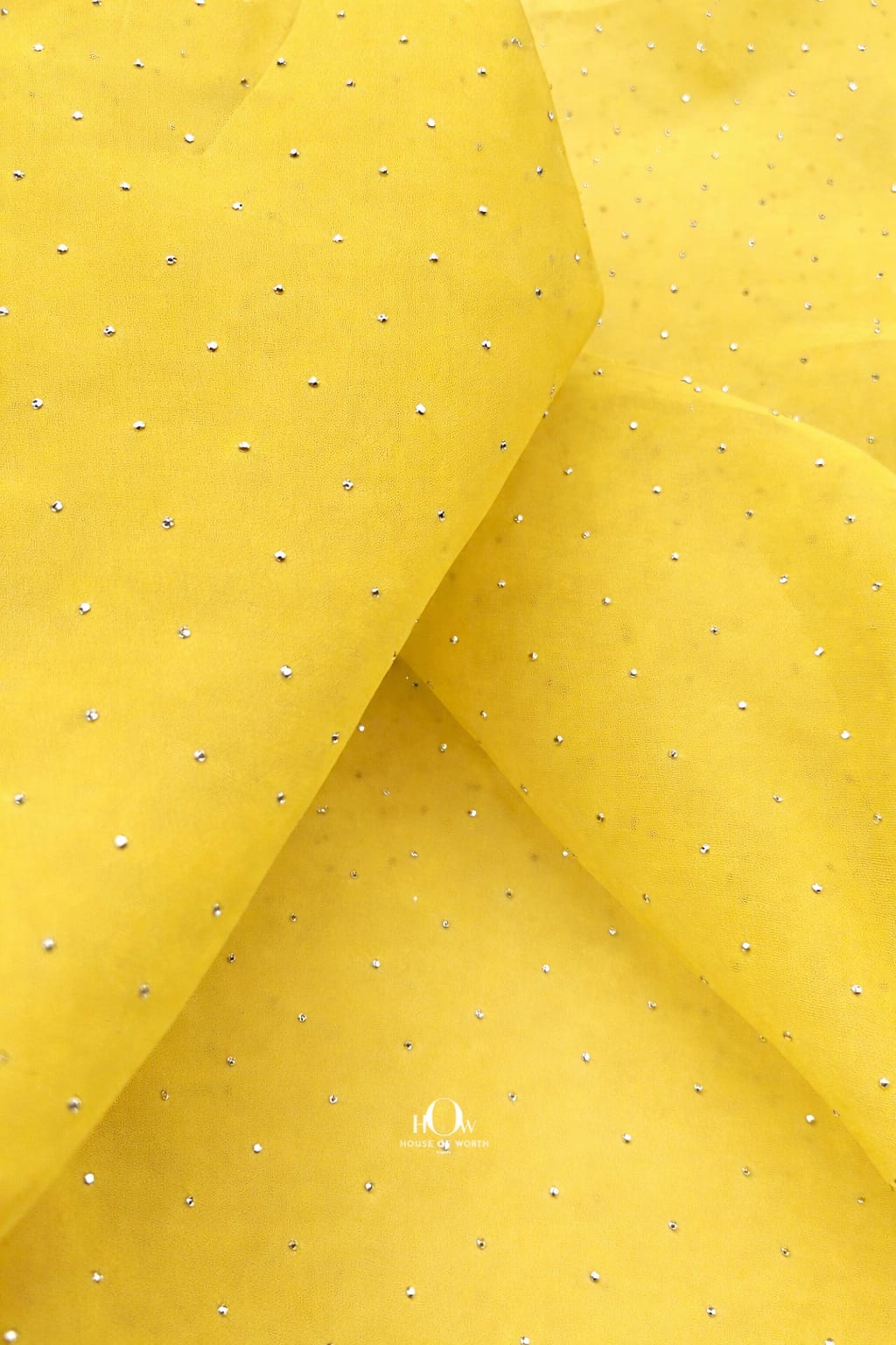 Lightweight yellow rhinestone organza cloth ideal for bridal sarees and dresses