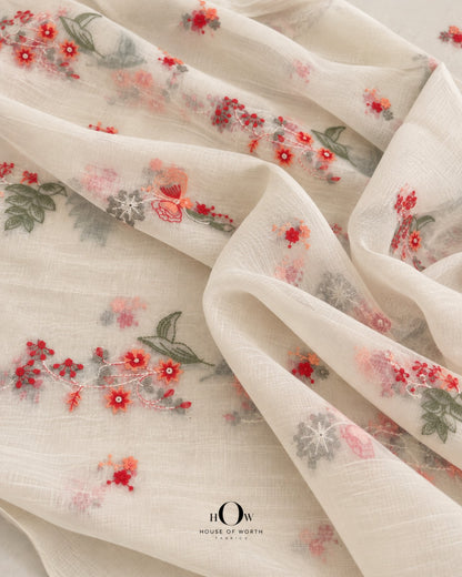 Ivory white Pure Mul Chanderi with coral red peach floral vine embroidery and muted green leaves