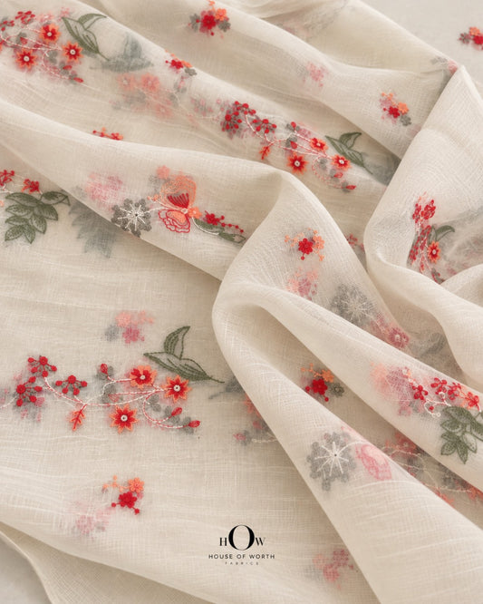 Ivory white Pure Mul Chanderi with coral red peach floral vine embroidery and muted green leaves