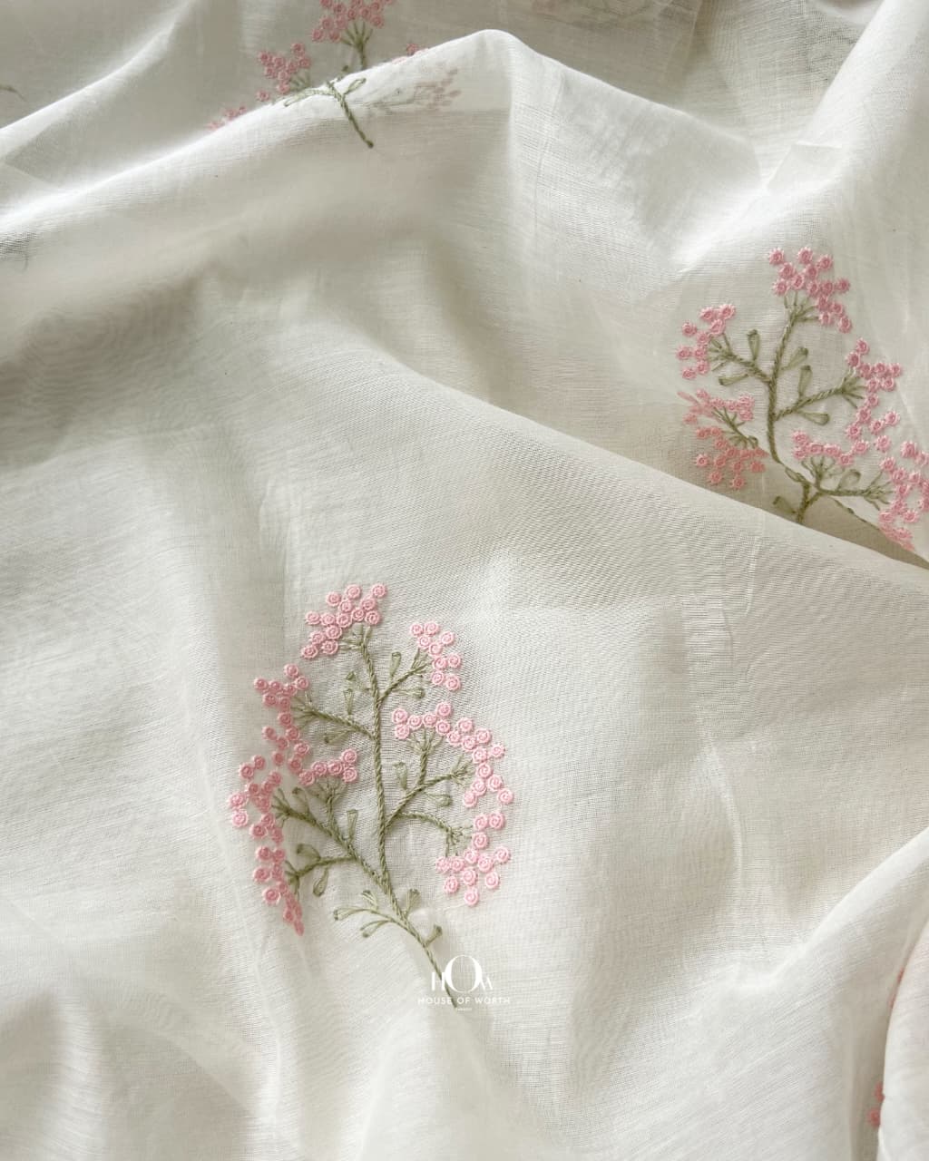 Blush pink embroidered Pure Mul Chanderi on an off-white base with floral butti