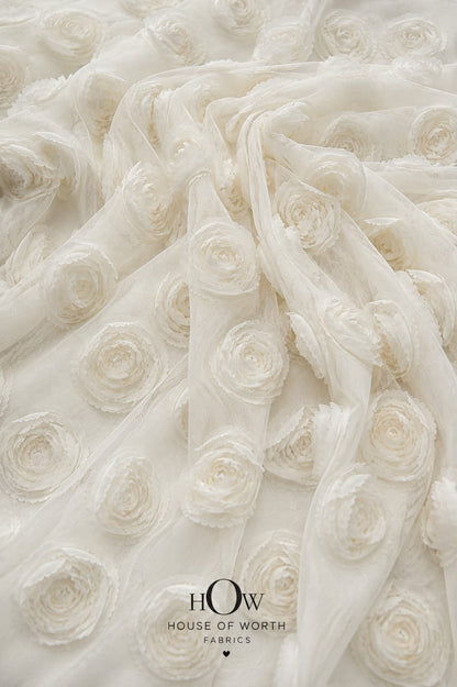 Ivory white all-over 3D floral net fabric for bridal gowns and couture