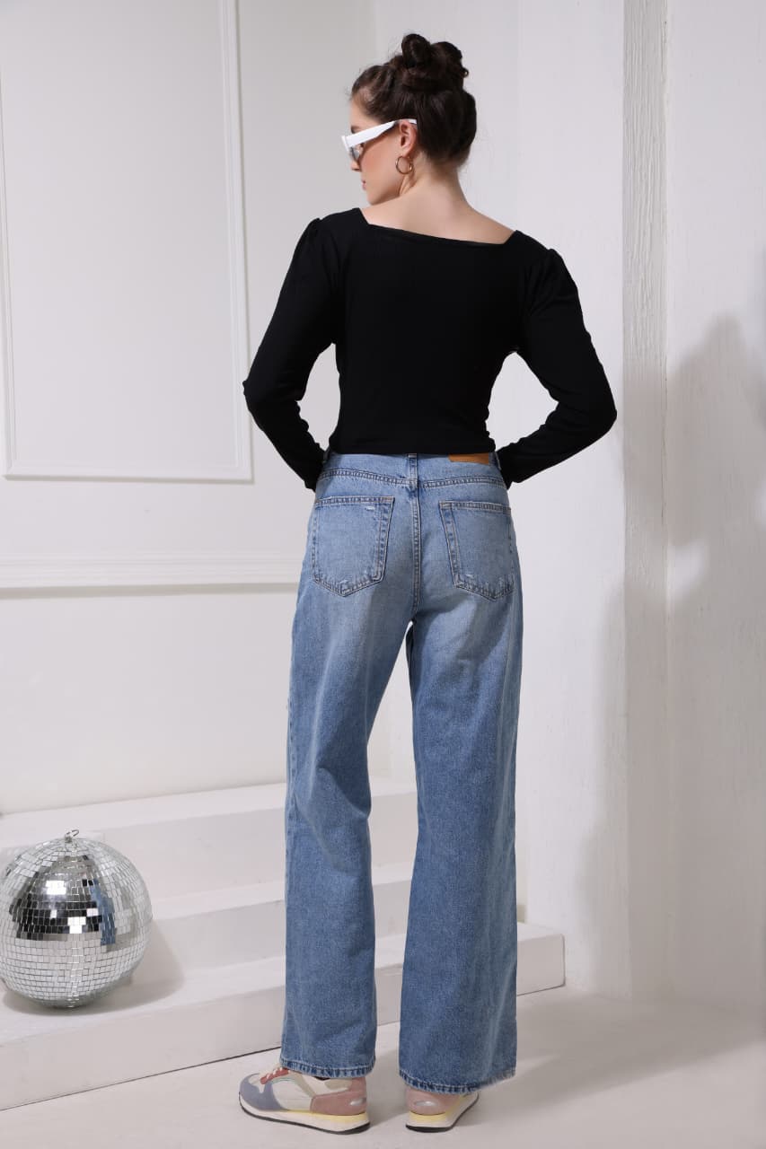 Women’s black casual tee with unique pattern and soft fit, perfect fashion essential