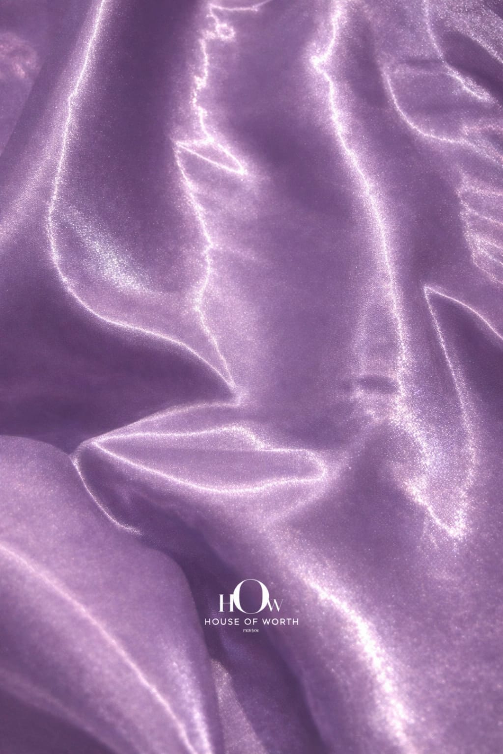 Premium glass satin fabric in soft lavender shade for couture wear