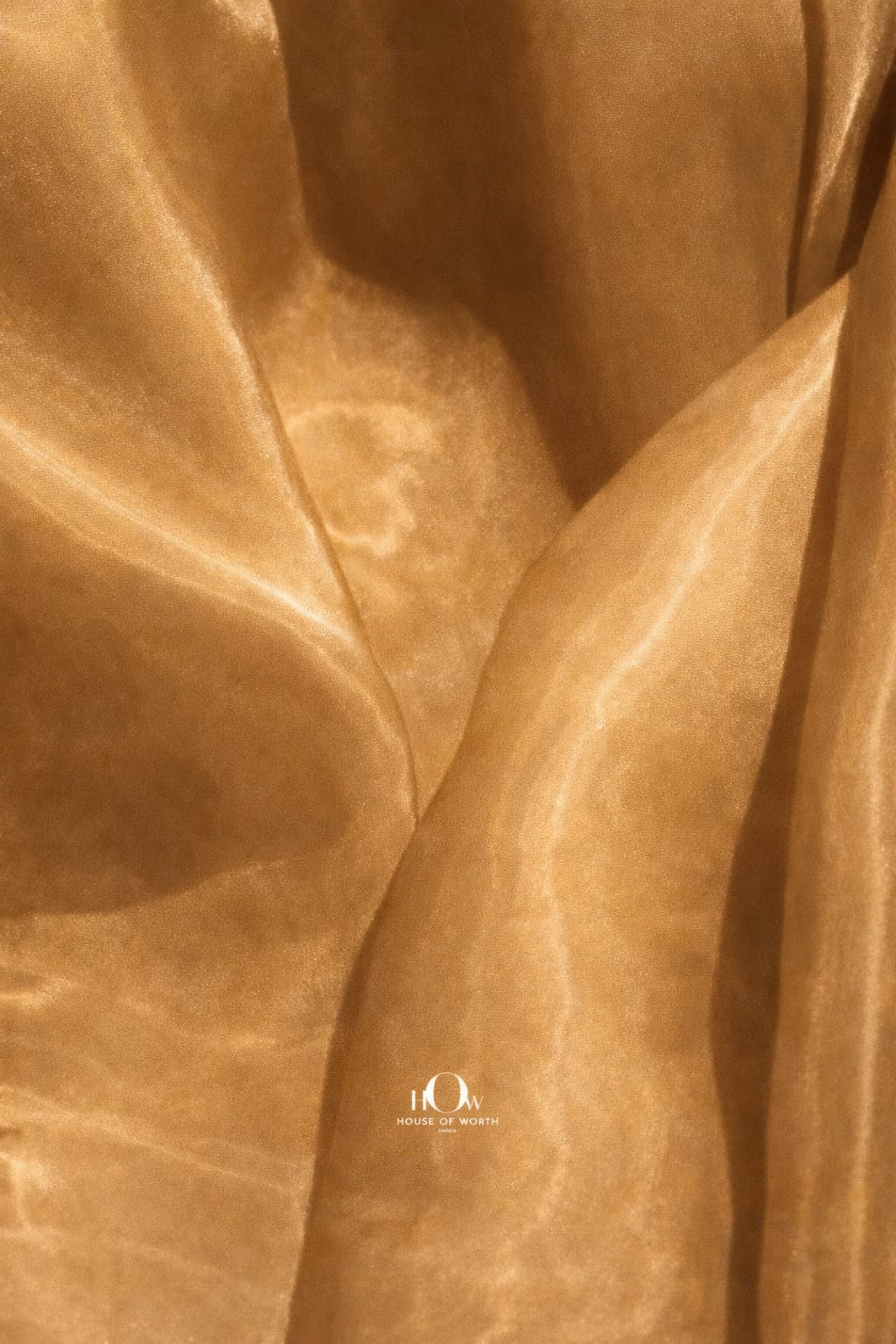 Premium golden glass organza fabric for sarees, gowns, and suits