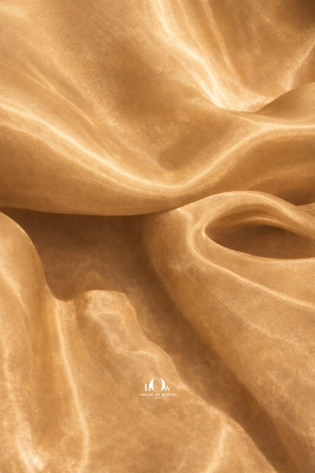 Luxury organza fabric in soft golden tone for designer collections