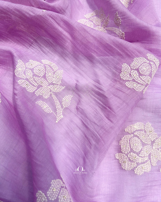 Lavender Mul Chanderi fabric with floral embroidery – soft, breathable fabric for elegant sarees and suits.