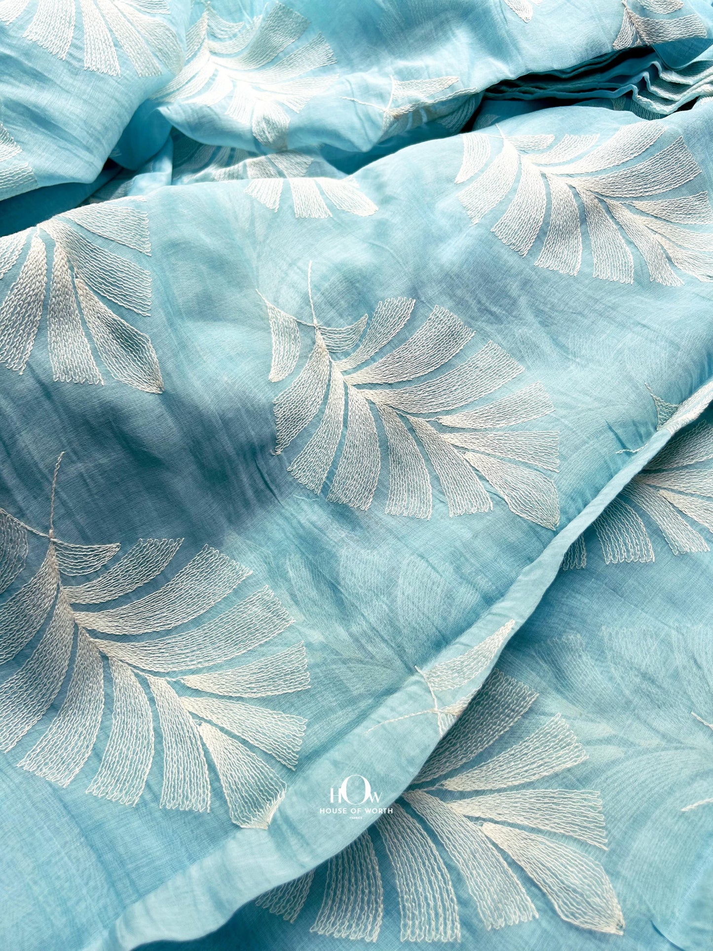 extured Mul Chanderi fabric with subtle tie-dye effect – premium quality sky blue fabric for retail and wholesale orders.