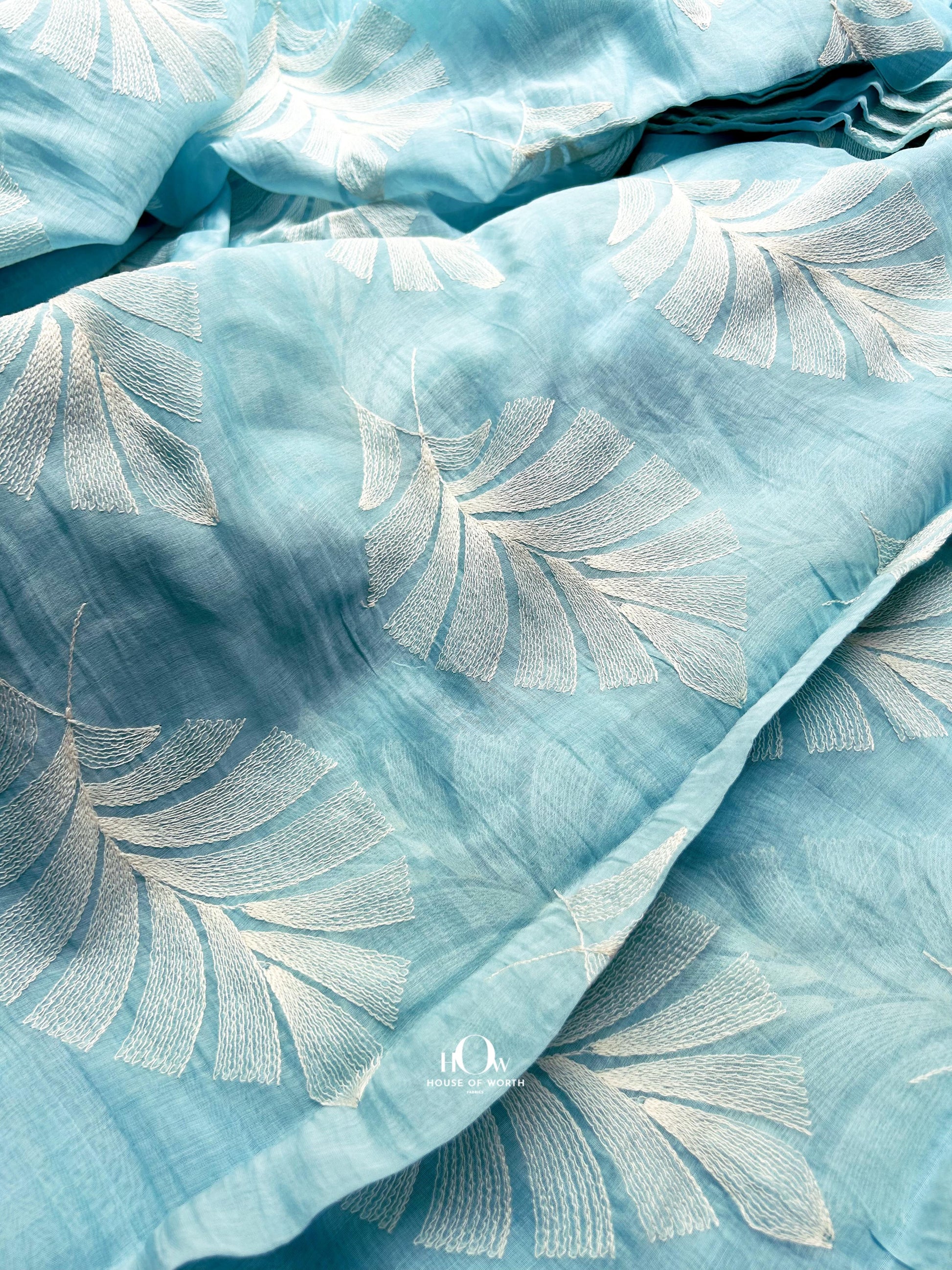 extured Mul Chanderi fabric with subtle tie-dye effect – premium quality sky blue fabric for retail and wholesale orders.
