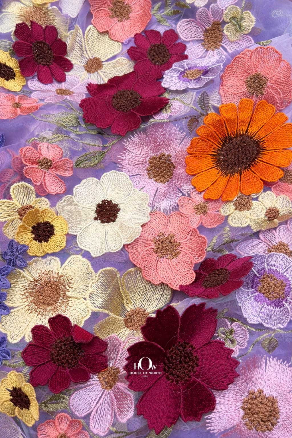 3d flower fabric in lilac net with raised petals, statement fabric for dresses and lehenga