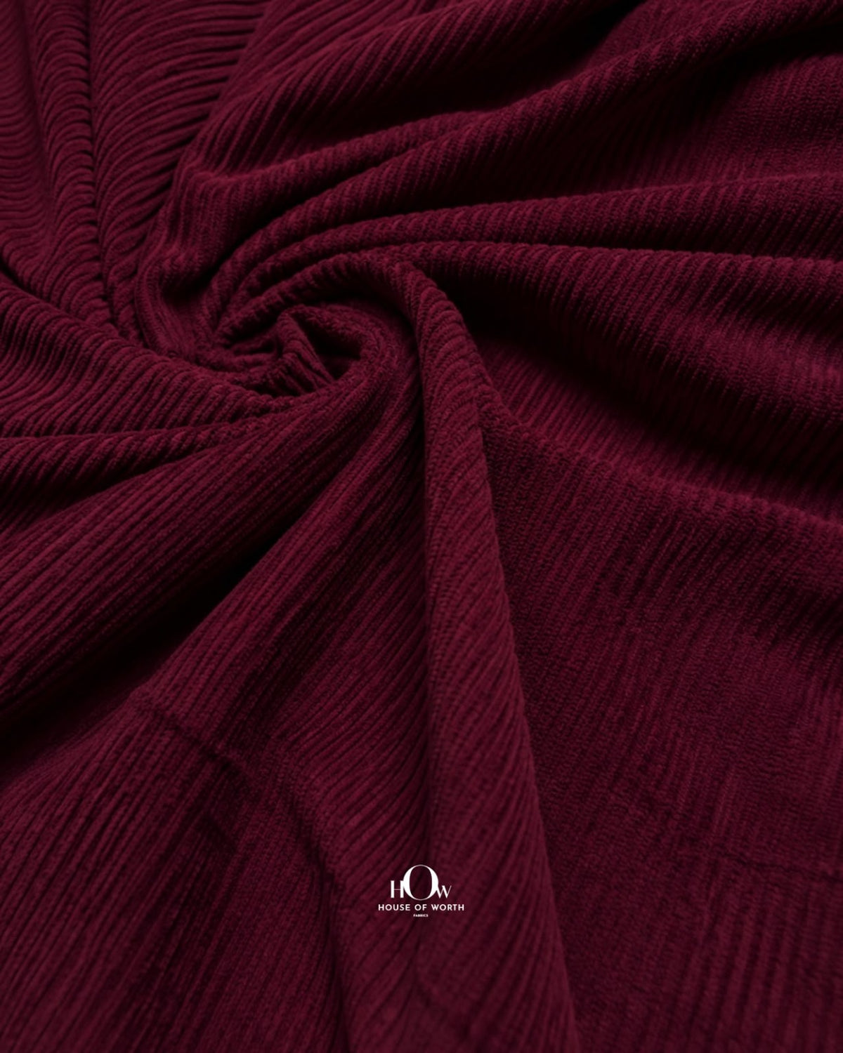 Maroon ribbed corduroy fabric for trousers, pants and smart casual tailoring