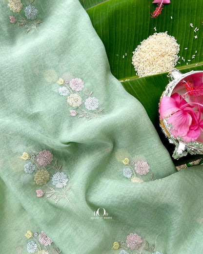 Mint green Pure Mul Chanderi fabric with scattered floral thread and sequin embroidery