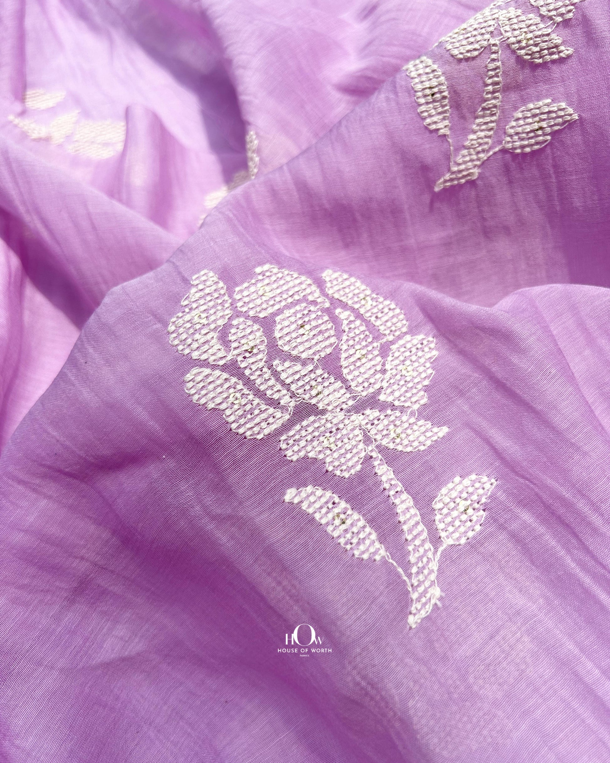Pure Mul Chanderi fabric with fine embroidery—lightweight and perfect for ethnic Indian dresses.