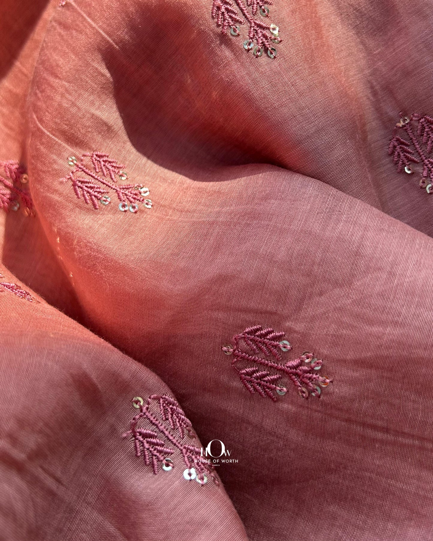Pure Mul Chanderi fabric with sequin butti embroidery – soft rust-toned fabric ideal for suits, sarees, and festive wear.