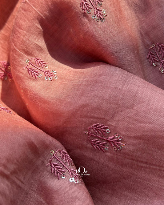Pure Mul Chanderi fabric with sequin butti embroidery – soft rust-toned fabric ideal for suits, sarees, and festive wear.