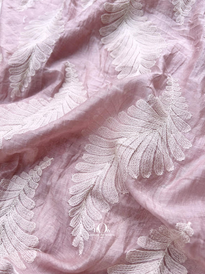 Light pink Pure Mul Chanderi fabric with jacquard leaf motifs – ideal for festive sarees, dupattas, and designer suits.