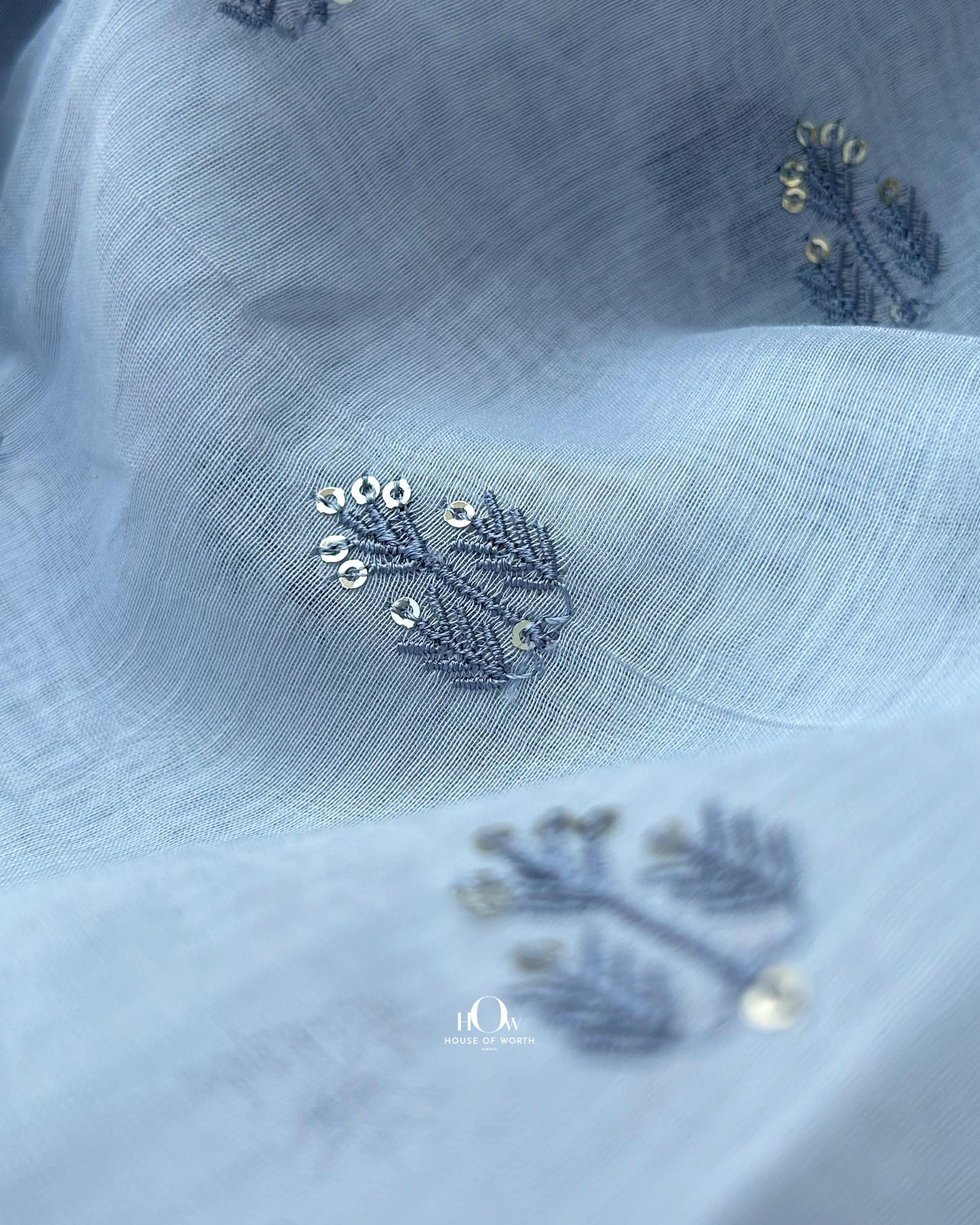 Handwoven light blue Mul Chanderi fabric with minimal butti work – lightweight and flowy for ethnic collections.
