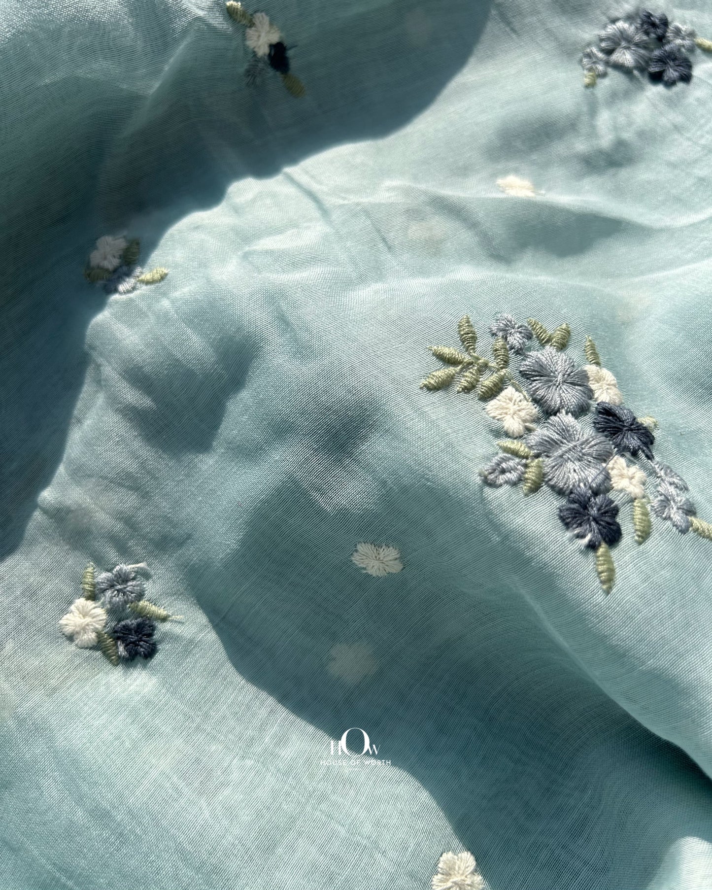 Pastel Chanderi fabric with delicate butta work – available for wholesale and per meter retail orders.