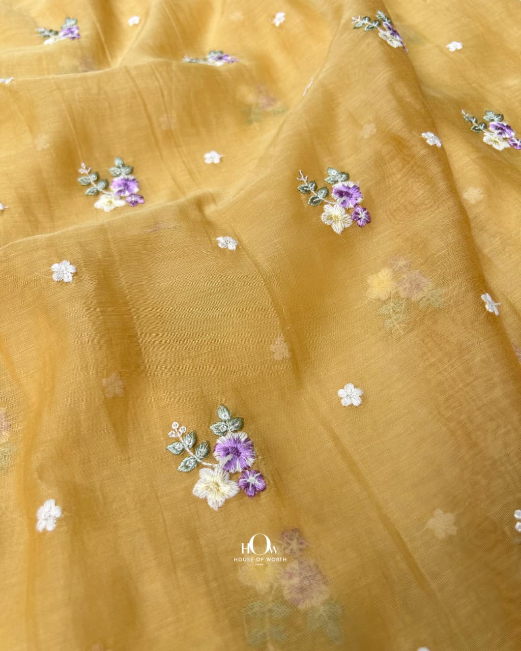 mustard yellow chanderi fabric with scattered floral buti embroidery