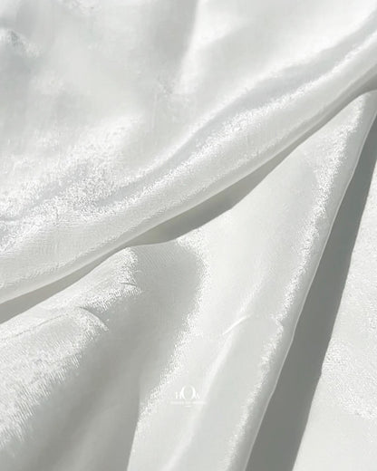 Wholesale dyeable crepe fabric rolls – ideal for western gowns and sarees in Delhi.